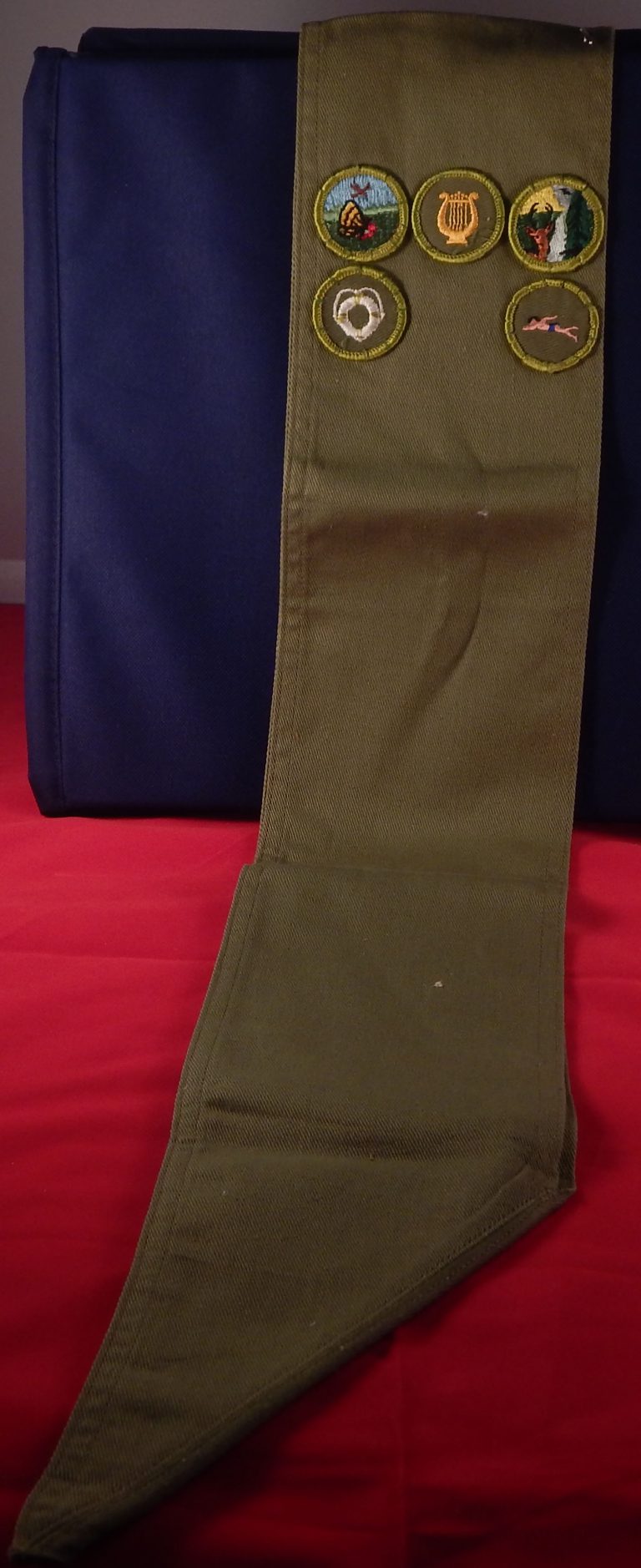 Sash Khaki 30.5" with 5 Khaki rolled edge merit badges